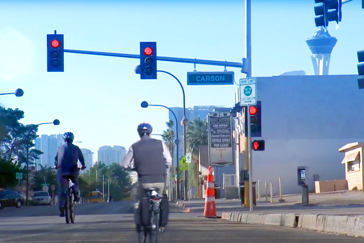 Image of men on bicycles, Main St project from Charles River Analytics.