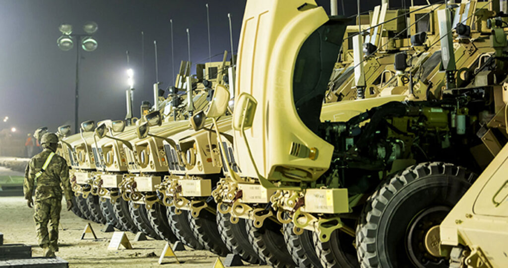 Soldier inspects vehicles to ensure operational readiness